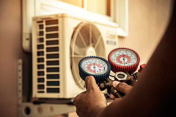 Professional Air Conditioning Service technician working in Lincoln, AL